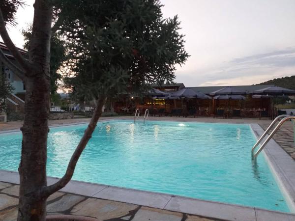 Отель Caretta Village