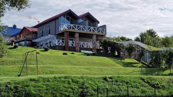 Duarto house, Sauna and Hot Tub, Забронировать Отель Šiaudinė Таураге