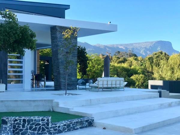 Badgemore Villa Guesthouse, Забронировать Гостевой дом Кейптаун Центр Кейптаун