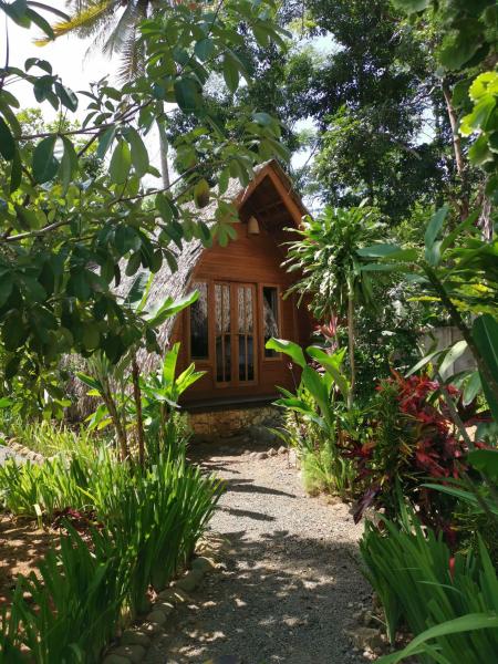 Coconut Tree Cottages, Забронировать Отель Батукарас провинция Западная Ява