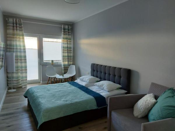 Apartamenty z tarasami "Miętowy spokój 15" "Romantyczna szarość 16" "Niebieska elegancja 17" maksymalnie dla 6 osób