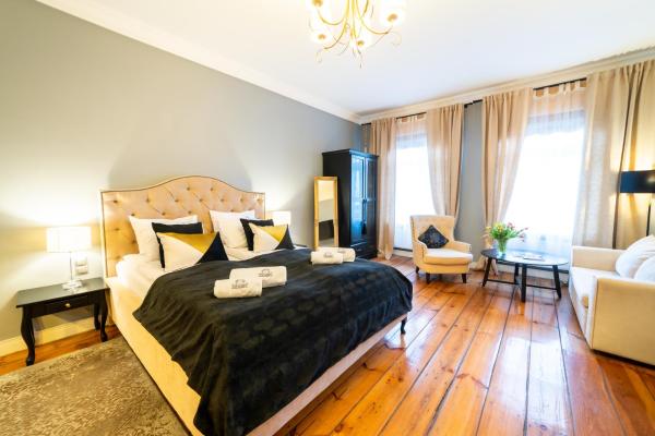 Apartamenty Pod Zegarem, Забронировать Апартаменты/квартира Недорогие отели Mikolajskie Lake, недорогие