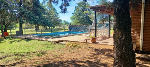 Cabañas UN LUGAR, Забронировать Дом для отпуска Вилья-Хенераль-Бельграно Calamuchita Valley