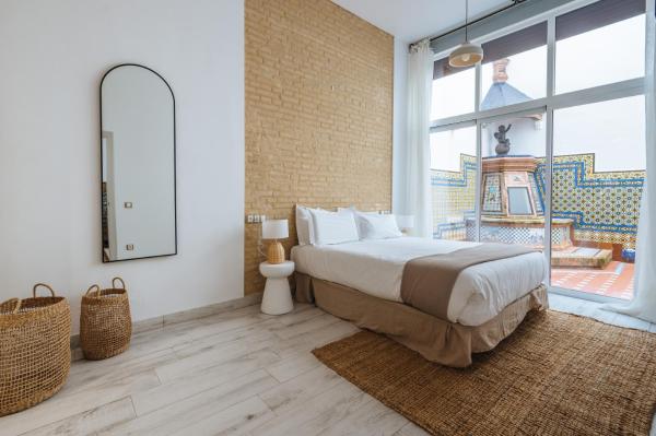 Apartamentos "El Escondite de Triana", Забронировать Апарт-отель Апарт-отели Севильи, рядом с Edificio Expo, Апарт-отель