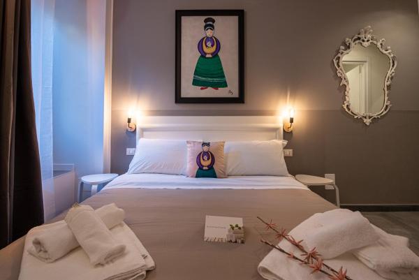 LE MADAMINE ROOMS, Забронировать Гостевой дом Сан-Сальварио Турин, рядом с Консерватория имени Джузеппе Верди