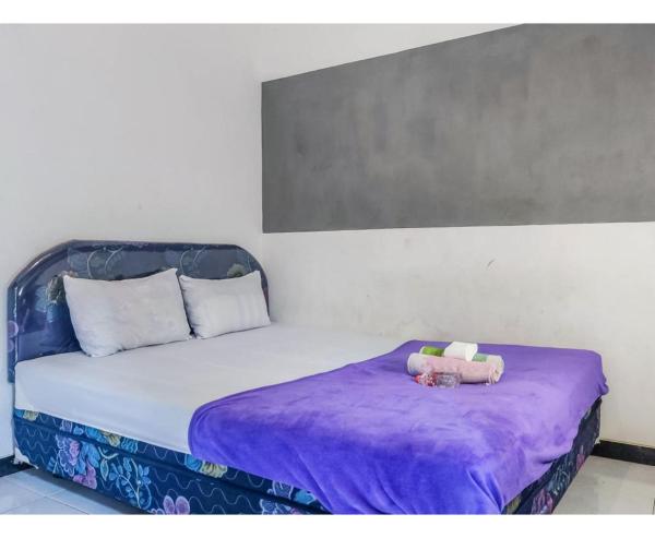 Kartini Guest House near Alun Alun Probolinggo, Забронировать Отель Sukobumi провинция Восточная Ява