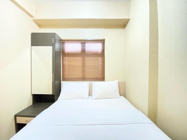 Modern Designed 2BR at Suites @Metro Apartment By Travelio