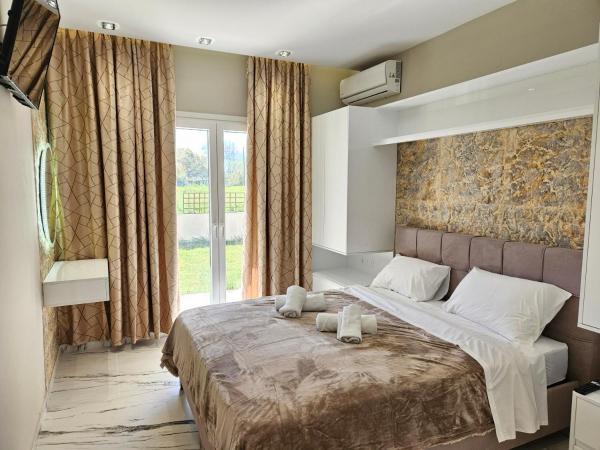 Evelina Luxury Suites with Swimming Pool in Corfu, Забронировать Апартаменты/квартира Ипсос Корфу