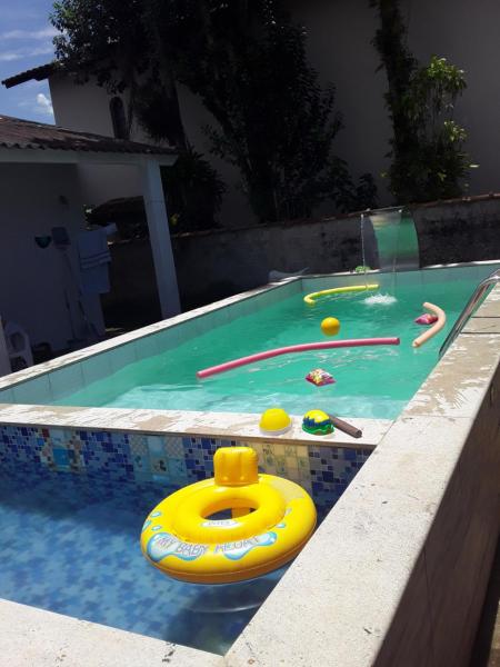 CASA DE PRAIA COM DUAS PISCINAS E GARAGEM, Забронировать Дом для отпуска Отели Сан-Паулу с парковкой, Парковка