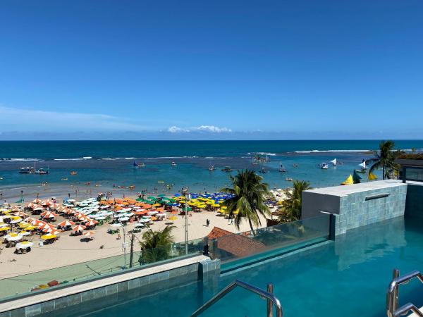 Flat à Beira Mar com Varanda em Frente as Piscinas Naturais 307, Забронировать Апартаменты/квартира Ипожука Пернамбуку
