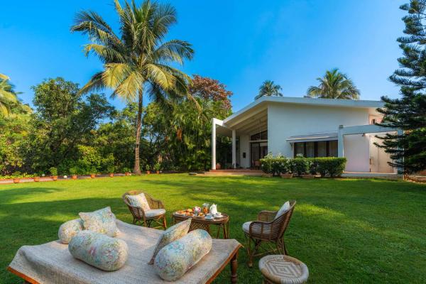 The Beach House by StayVista with Modern interiors, nearby beach, pool, lawn