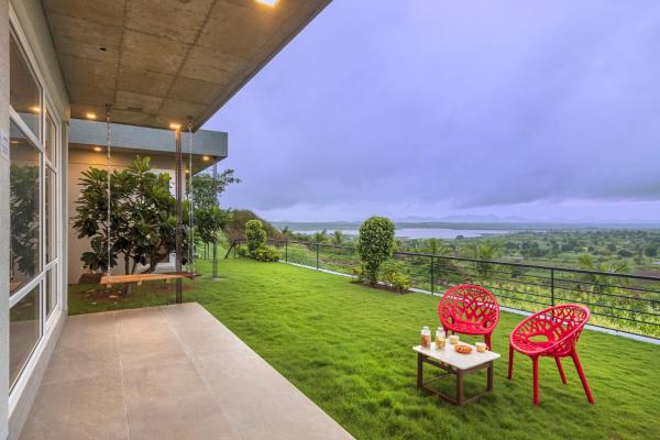 SaffronStays Serenity - 2BR villa overlooking Lake Kadwa with garden, swings & treks near Sula Vineyard