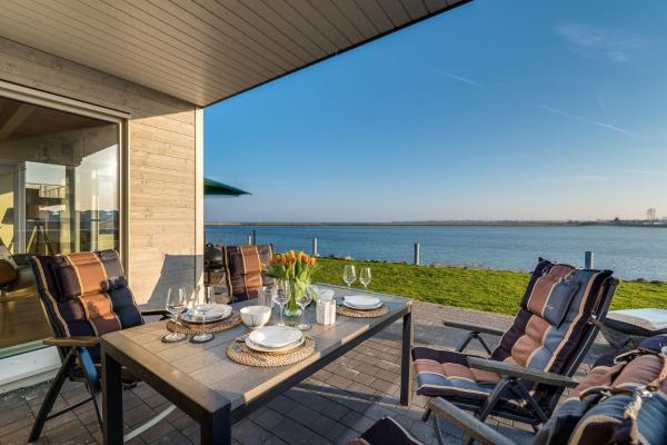 Ferienhaus StrandLiebe, Забронировать Дом для отпуска Ольпениц Schlei