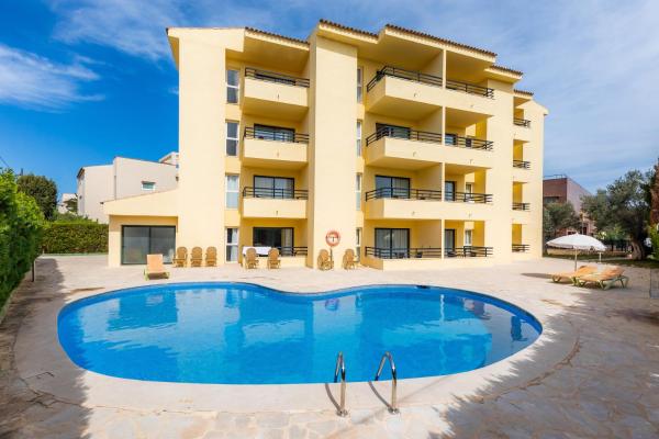 Apto con Terraza 201, Забронировать Дом для отпуска Коттеджи Кала-Миллор, Коттедж