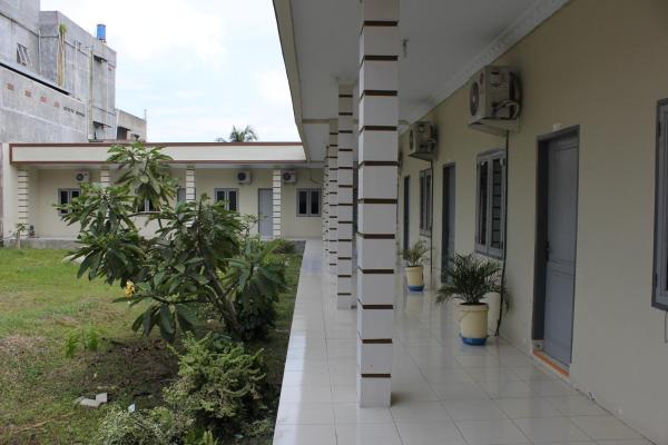 Penginapan Transit Tomato, Забронировать  Танджунгморава 