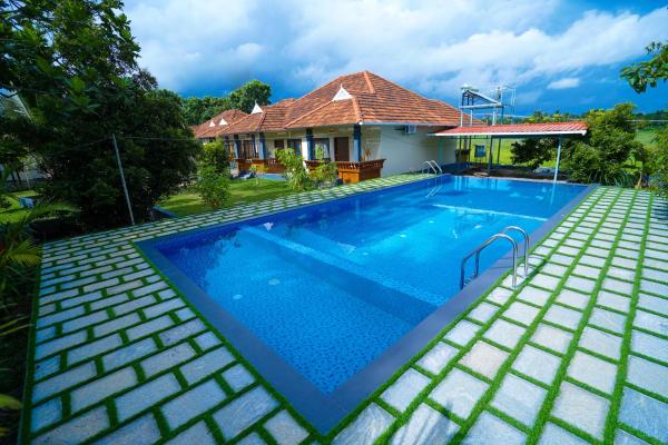 KOTTACKAL NATURE INN, Забронировать  Ангамали 