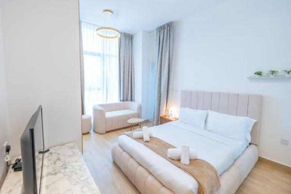Cozy Circle !Enjoyable Yet Affordable Studio Apartment, Забронировать  Отели Эмирата Дубая с парковкой, рядом с Dubai International Cricket Stadium, Парковка