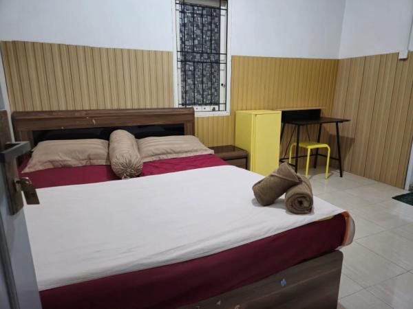 EMWEKA Guest House, Забронировать  Баликпапан провинция Восточный Калимантан