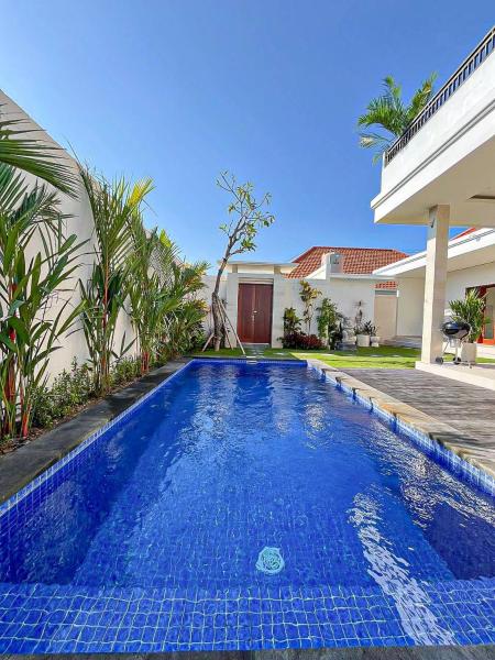 Canggu\s Hottest Spot - Brand New Villa with Rooftop Views 2BRs and PS5, Забронировать  Чангу Бадунг