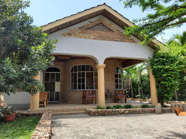 Namangi Cottage, Забронировать  Дар-эс-Салам Объединенная Республика Танзания