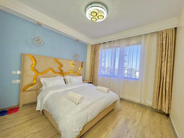 cozy corner two bedroom apartment with fully equipped gym heated swimming pool ample parking space and proximity to major shopping malls, Забронировать Апартаменты/квартира Отели Найроби с бассейном, Бассейн