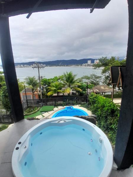 Casamar paraíso na praia com a vista do mar dos sonhos piscina e spa, Забронировать  Отели Сан-Паулу с бассейном, Бассейн