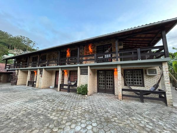 Residencial Sereno na Praia da Ferrugem, Забронировать  Гаропаба Санта-Катарина