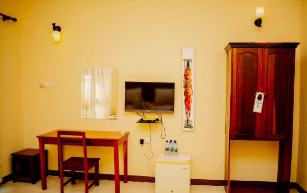 , Забронировать Курортный отель Kikaangoni Занзибар