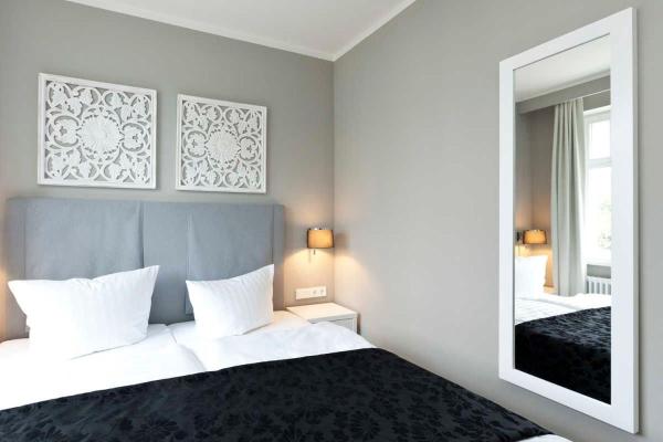 "Villa Minerva" Ferienwohnung 04, Забронировать  Отели Кюлунгсборн с парковкой, Парковка