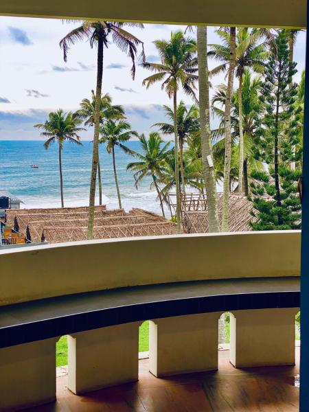 beach view balcony resort by hello varkala, Забронировать  Варкала штат Керала, рядом с Пляж Varkala Beach