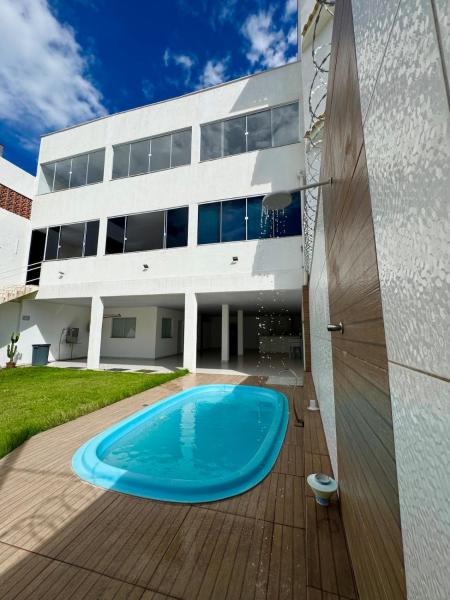 Casa na praia, Balneário de Carapebus, Забронировать  Отели Эспириту-Санту с парковкой, Парковка