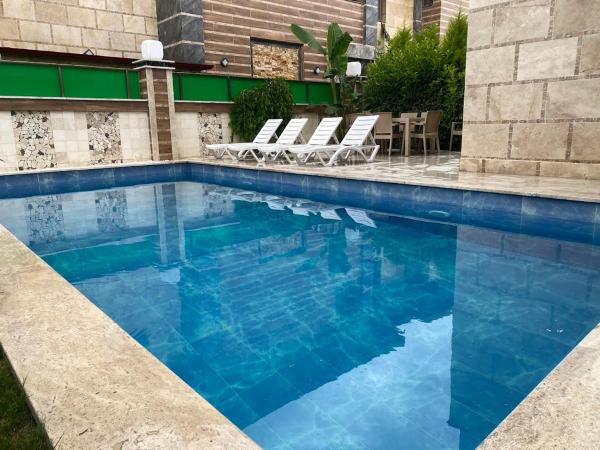 My RHYTM 4, Забронировать  Отели Кушадасы с парковкой, Парковка