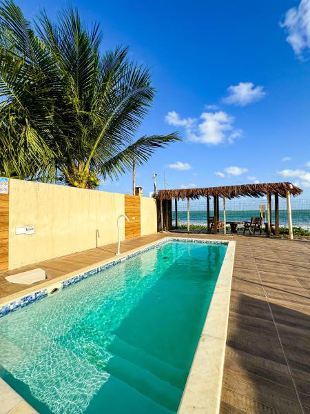 Casa de praia em Japaratinga, Забронировать  Отели Алагоас с парковкой, Парковка