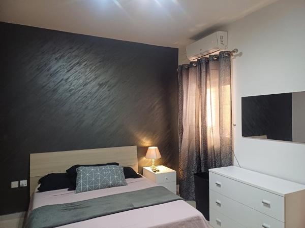 Modern Private Rooms in an apartment, Забронировать Апартаменты/квартира Сент-Полс-Бей Мальта, рядом с Malta National Aquarium