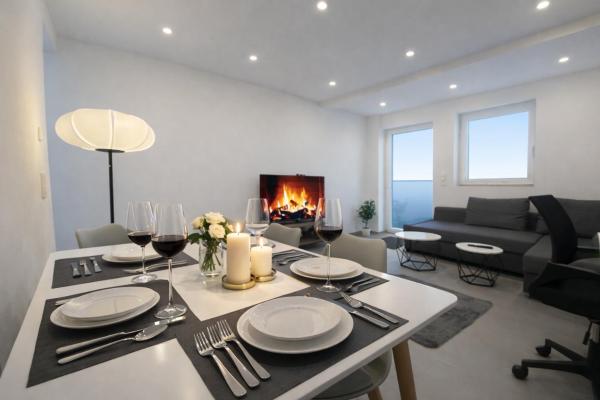 STN Apartment Suite - Ferienwohnung mit 2 Schlafzimmer & Parkplatz, Highspeed WLAN, Fußbodenheizung & Netflix Premium, Zentral zu Audi & Schwarz Gruppe, Забронировать  Бад-Фридрихсхалль Гейдельберг
