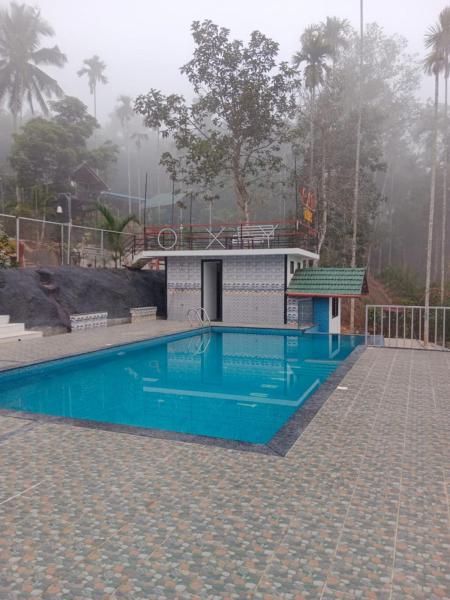 OXYHUT RESORT, Забронировать  Отели Wayanad Region с парковкой, Парковка