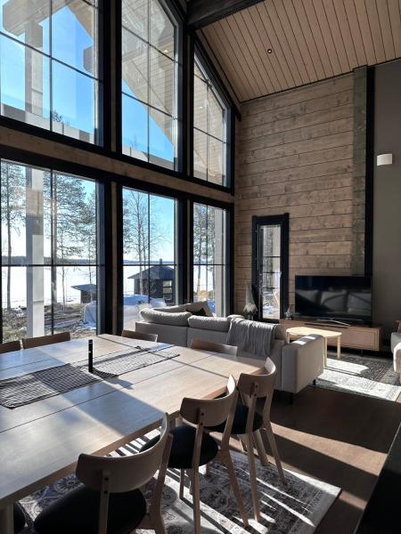 Villa Norvahovi - Lake view, sauna and wood interior, Забронировать  Рованиеми Лапландия