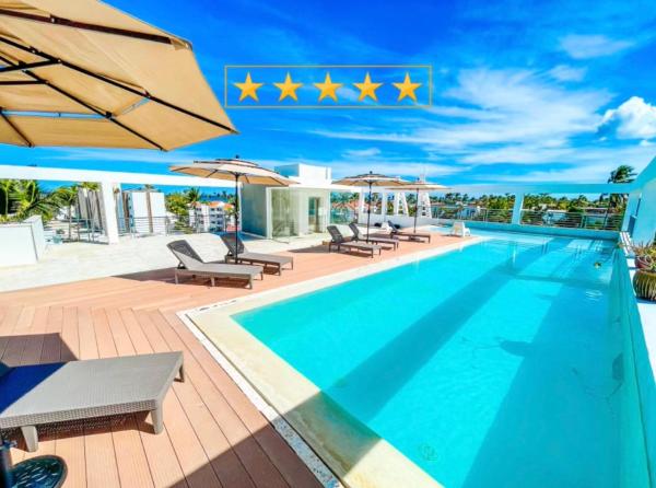 Caribbean WAVE DREAM BEACH Studios HOTEL with WiFi ROOFTOP POOL & SPA, Забронировать  Пунта-Кана Доминиканская Республика
