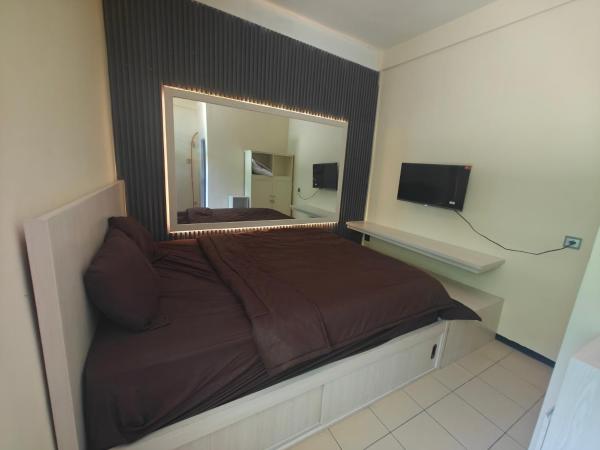 Roomy guesthouse, Забронировать  Sengkaling провинция Восточная Ява
