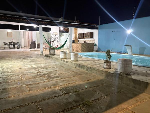 Casa com piscina, 3 quartos, 2 km das praias, Забронировать  Отели Мараньян с парковкой, Парковка