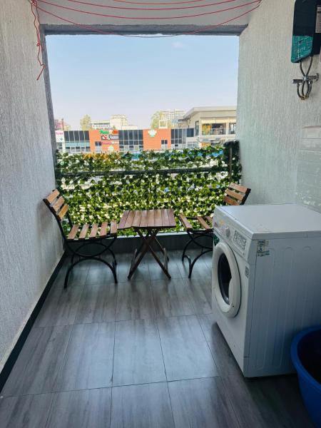 Comfort living three bedroom apartment with fully equipped gym swimming pool private parking space ,child play area and amazing scenic views, Забронировать Апартаменты/квартира Найроби Руанда, рядом с Adams Arcade Shopping Centre
