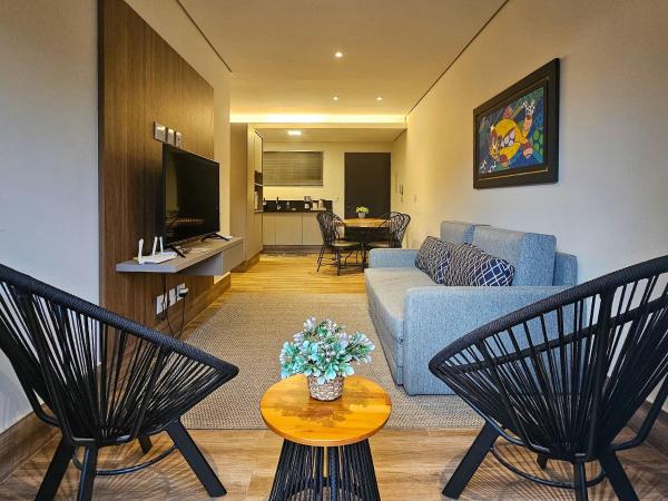 Flat Bonito Village, localização central, piscina, Забронировать  Отели Санта-Катариной с парковкой, Парковка