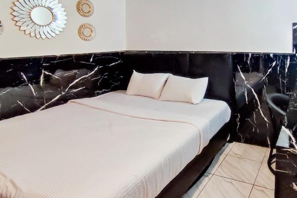 Urbanview Hotel Dream Guesthouse Padang, Забронировать  Кампундуриан Суматра