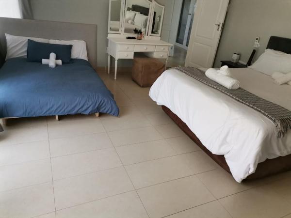 Megs Guesthouse, Забронировать  Отели Durban North Coast с парковкой, Парковка