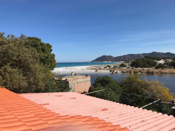 On The Sea Villa Fenicottero, Забронировать  Capo Comino Сардиния