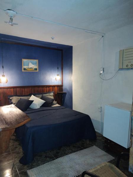 Pousada Dádiva Suite Romântica Simples a passos da praia do Pontal Centro com ar condicionado e frigobar, Забронировать  Парати Serra da Bocaina