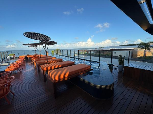 Setai à beira-mar com rooftop incrível, Забронировать  Отели Параиба с парковкой, Парковка