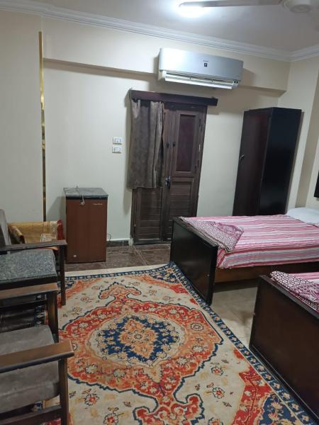 فندق الإيمان El Eman Hotel, Забронировать  Maḩaţţat Idfū Асуан