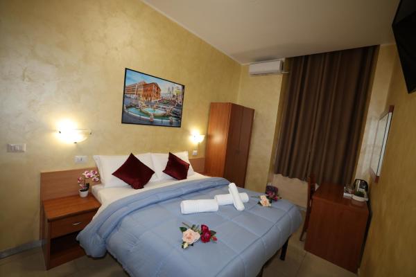 Dreamland Guesthouse, Забронировать  Рим Лацио, рядом с Базилика Санта-Парасседе