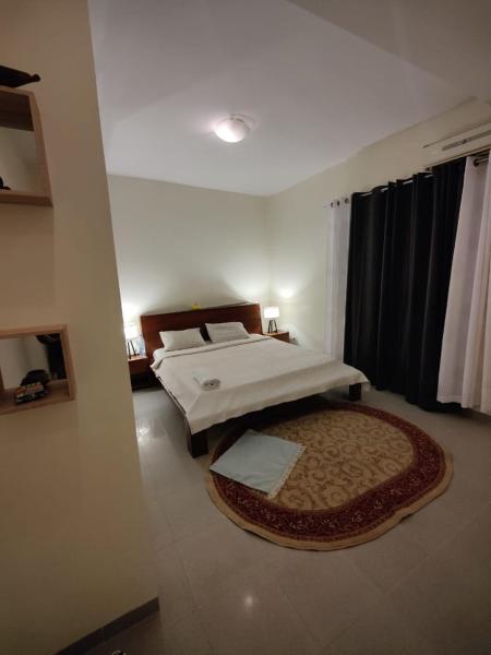 Center appart chez ZENA, Забронировать  Отели области Дакара с парковкой, Парковка